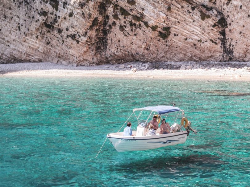 three person in boat