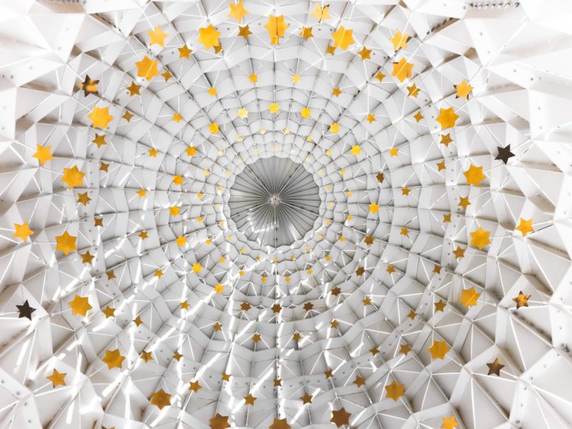 low angle photography of white and yellow dome