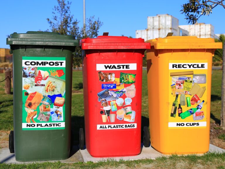 red yellow and green trash bins